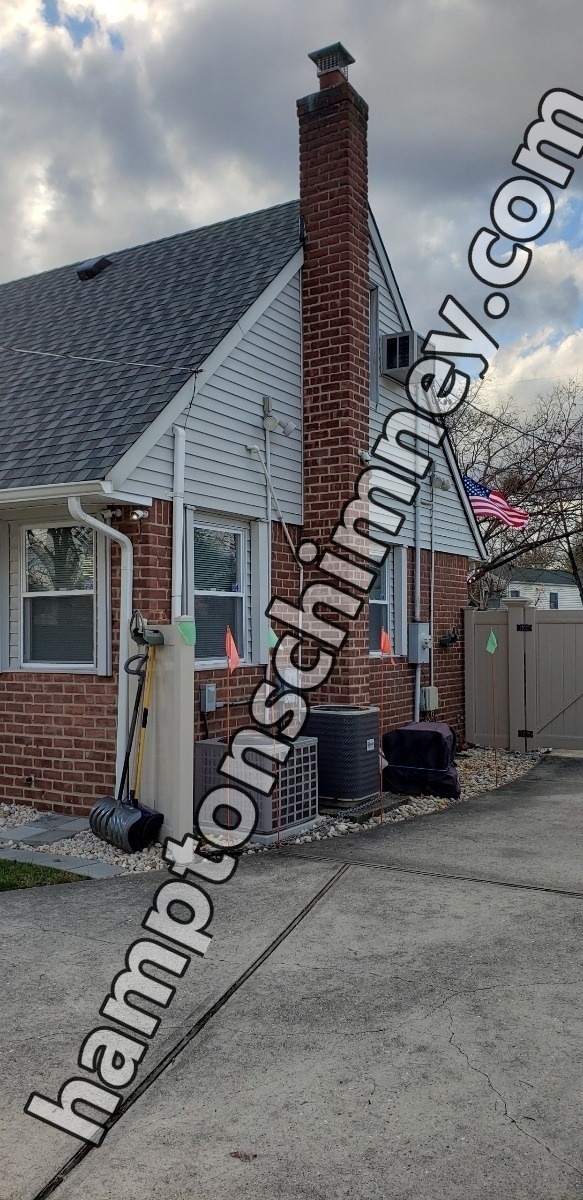 Professional chimney repointing restoring brick joints in The Hamptons, NY